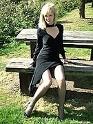 Beautiful Laura is outside and showing off her nylon stockings and high heels