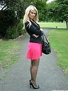 Hot blonde in barely black pantyhose and high heels