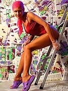 Leggy beauty LilyWOW posing in tan pantyhose