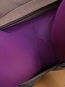 Hot blonde secretary Syren Sexton in purple opaque pantyhose and high heels