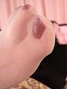 POV photos of feet in pantyhose