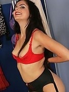 Sultry MILF in stockings and suspenders