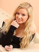 Curvy blonde Hollie in sexy black nylon layers