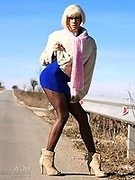 MILF in sexy pantyhose and heels offers sex for money on the road